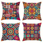Load image into Gallery viewer, Four colorful patterned pillows arranged in a grid.

