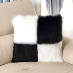 Load image into Gallery viewer, Black and white checkered pillow on a beige sofa
