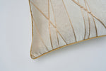 Load image into Gallery viewer, Decorative pillow with gold geometric pattern on a light gray background
