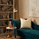 Load image into Gallery viewer, Modern living space styling featuring an abstract gold foil velvet throw pillow on an elegant accent sofa
