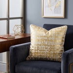 Load image into Gallery viewer, Luxury gold foil velvet cushion cover with abstract distressed print displayed on a charcoal velvet armchair

