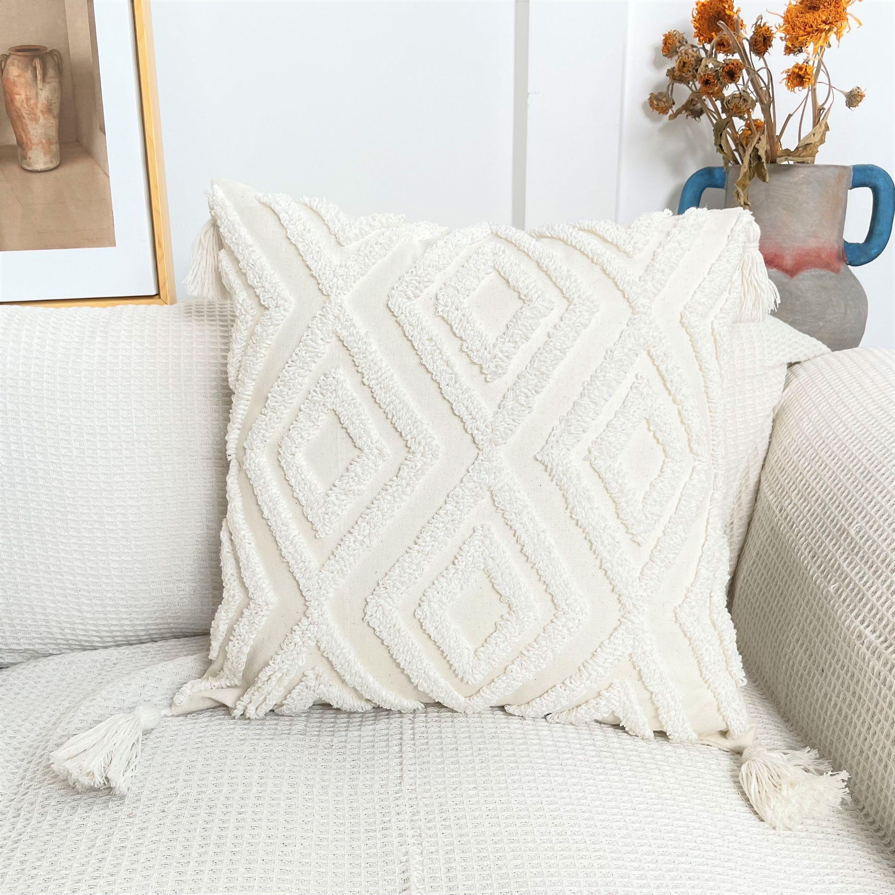 Bohemian tufted cushion cover with tassel accents in pure cotton fabric