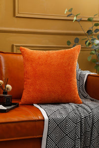 Orange chenille pillow cover in solid pattern, ideal for modern interiors