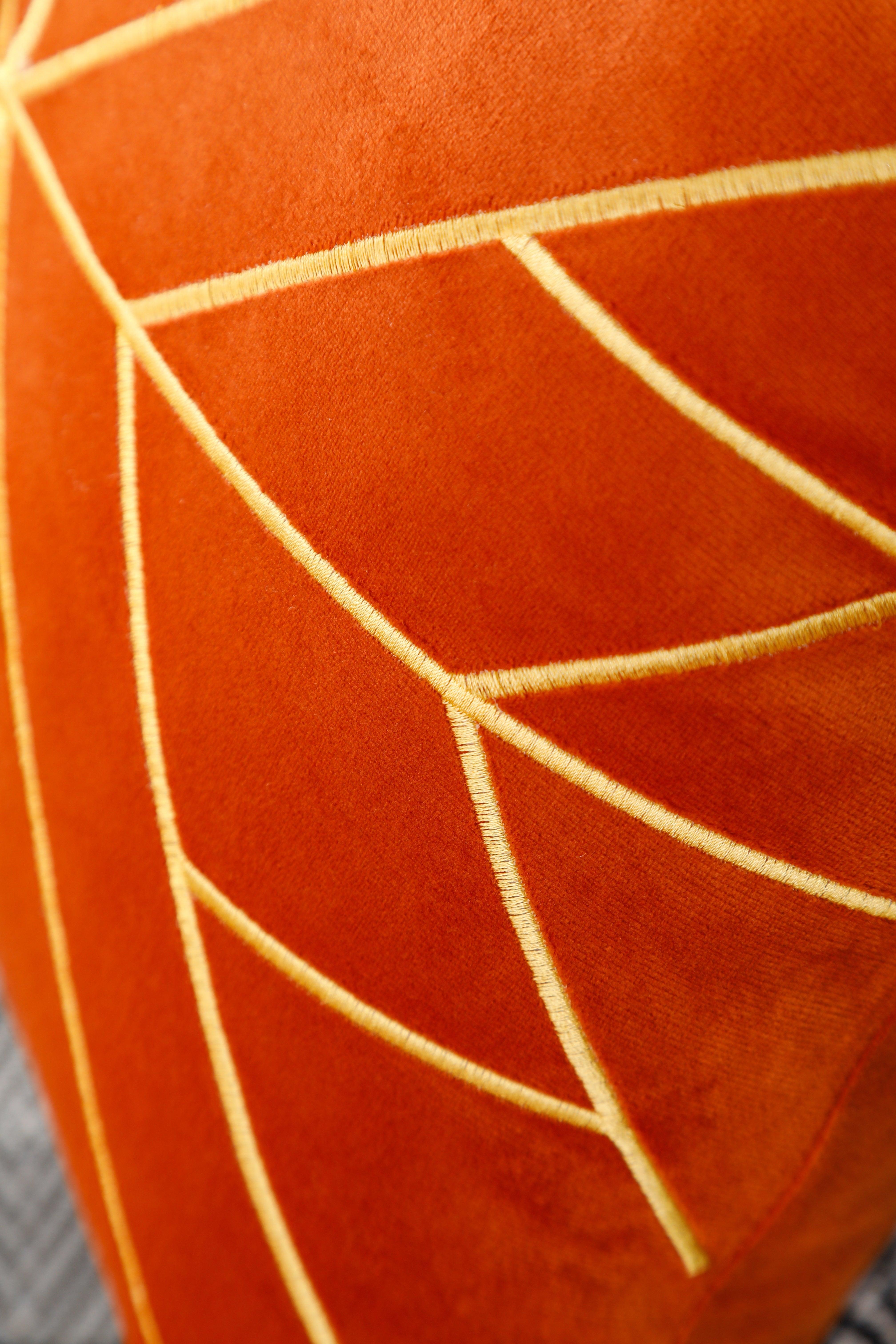 Luxury gold embroidered cushion cover made of soft orange velvet, 18x18 inches.