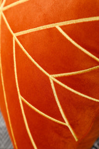 Luxury gold embroidered cushion cover made of soft orange velvet, 18x18 inches.