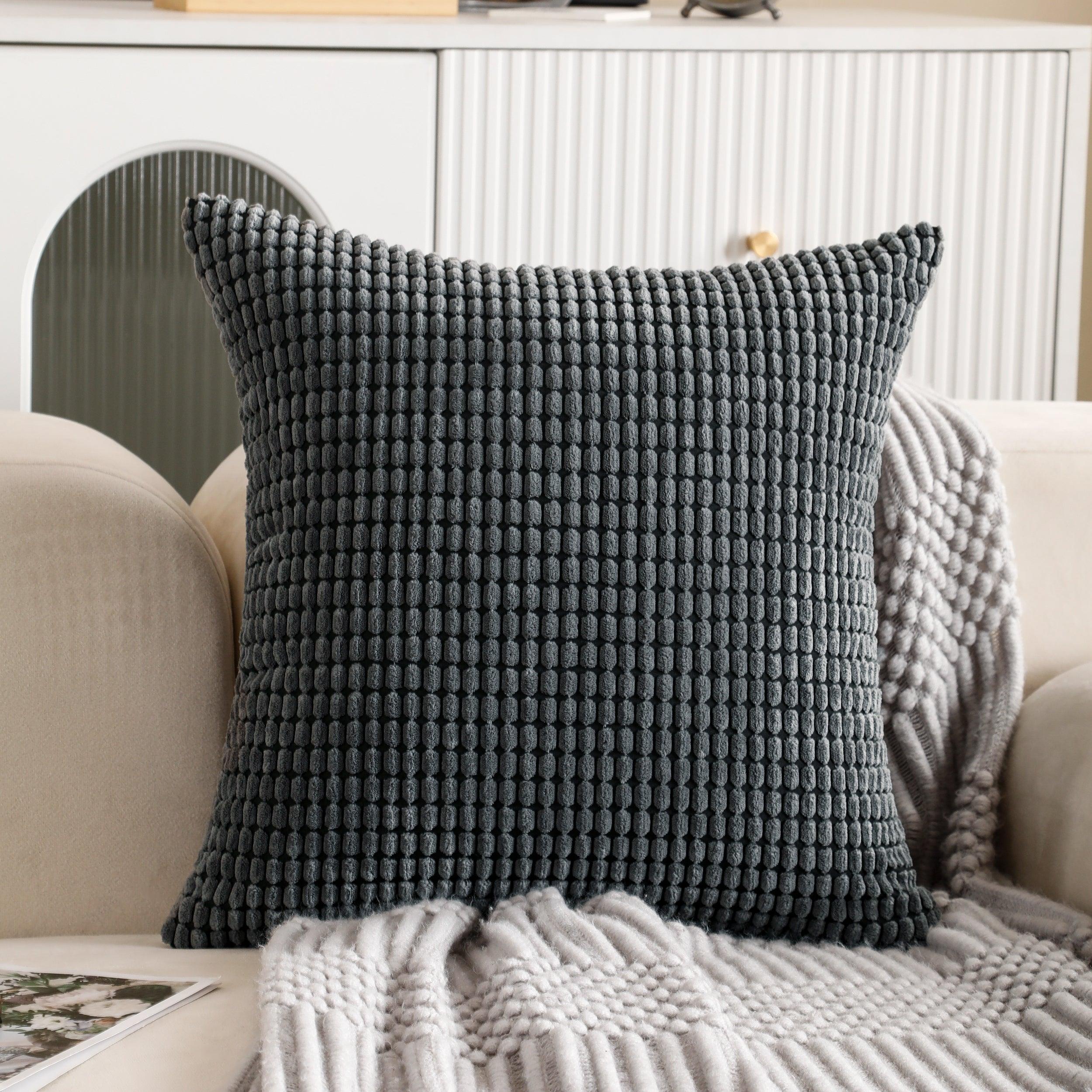 Square grey corduroy cushion cover with a soft, textured fabric