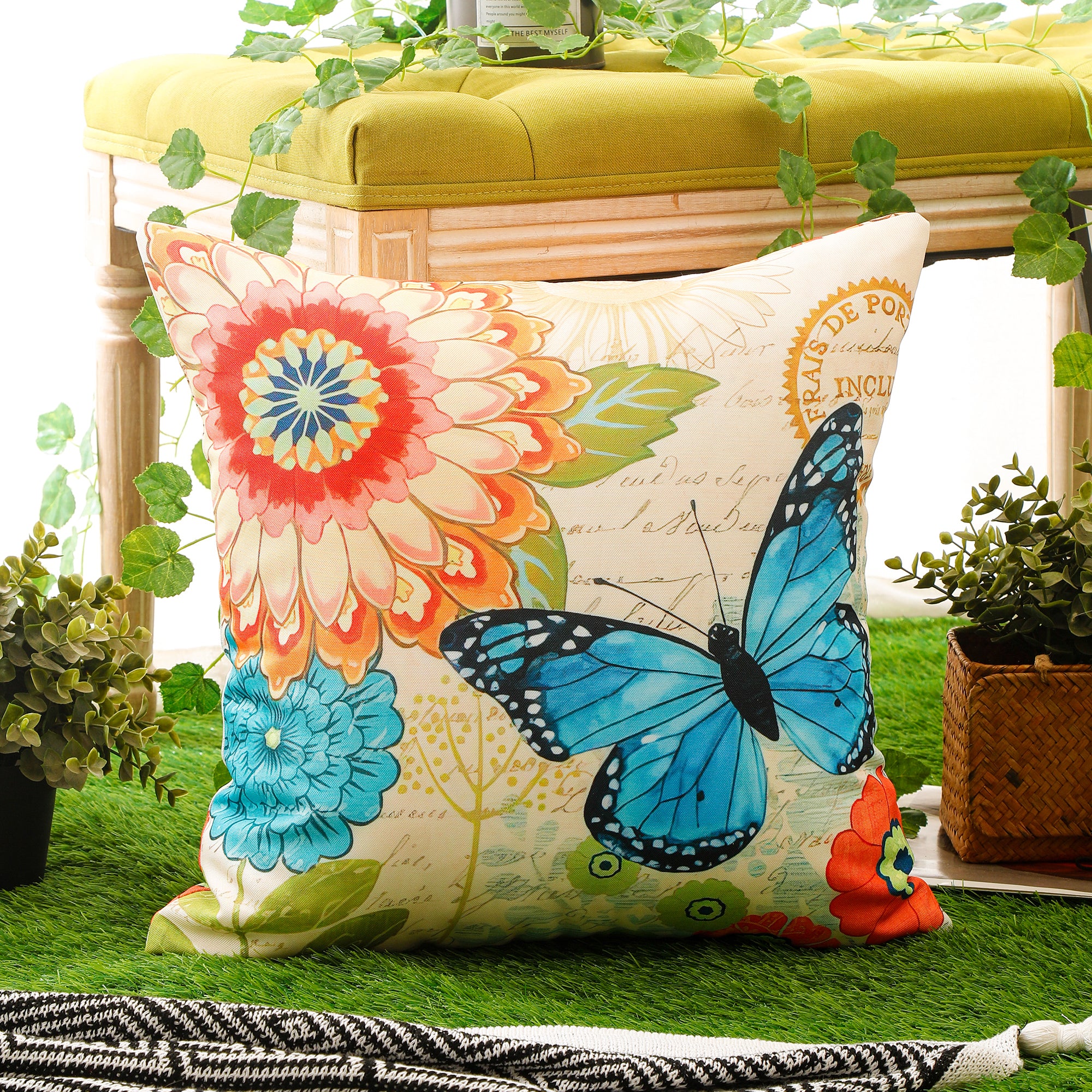 Soft and weather-resistant floral and butterfly print throw pillow cover.