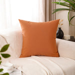 Load image into Gallery viewer, Decorative square cushion covers in warm orange tones for living room
