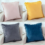 Load image into Gallery viewer, Soft velvet cushion cover featuring pom pom accents for stylish interiors.
