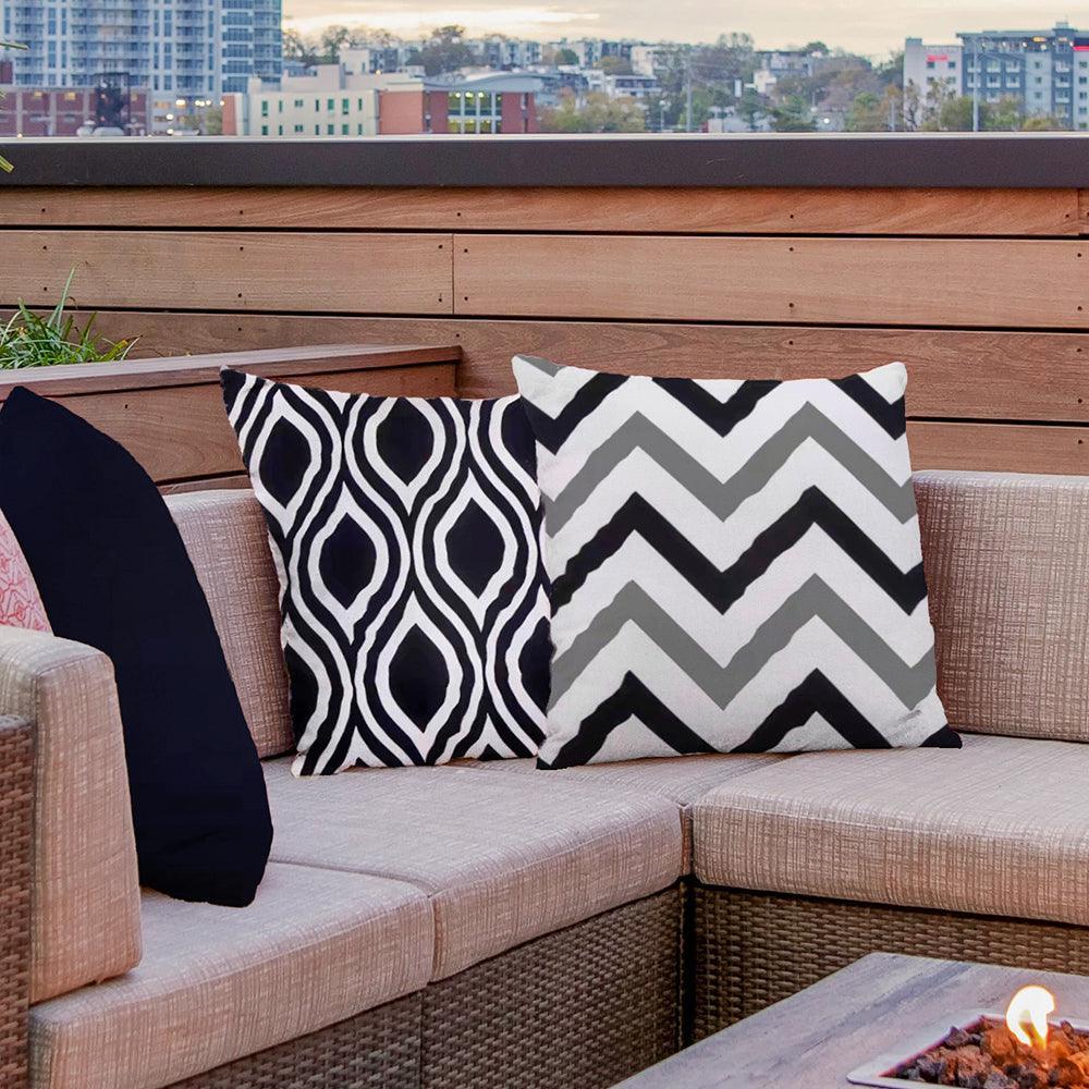 Black weatherproof cushion cover in 45x45cm size, perfect for outdoor seating