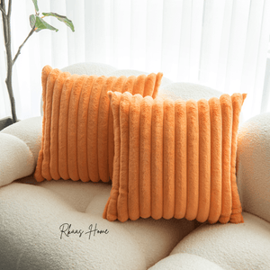 Textured and plush faux fur cushion cover with elegant striped corduroy style.